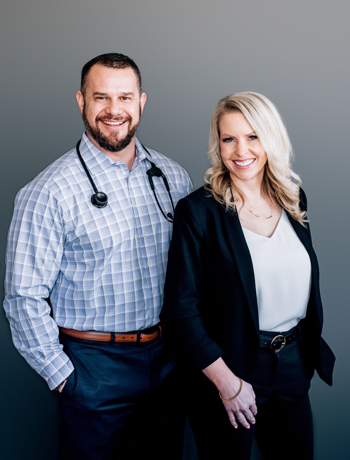 Dr. Emily Bullock standing with a physician